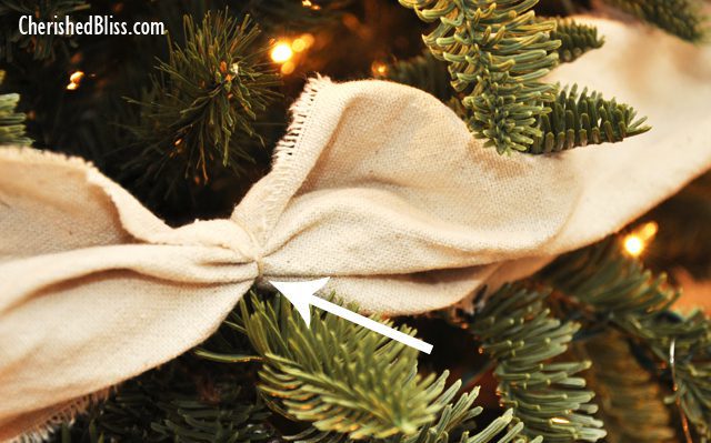 Save on your Christmas decor budget with this DIY Drop Cloth Christmas Tree Garland Tutorial
