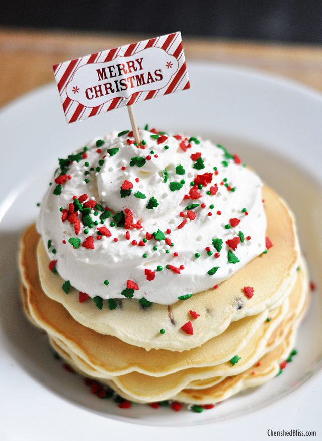 Enjoy these Merry Christmas Chocolate Chip Pancakes with Homemade Whipped Topping. Perfect for that Christmas morning! 