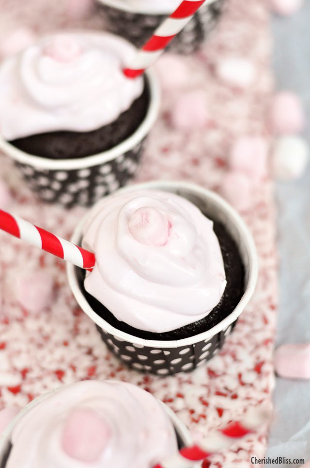 These yummy Hot Chocolate Cupcakes with a Peppermint Marshmallow Frosting are the perfect dessert for your holiday parties! 