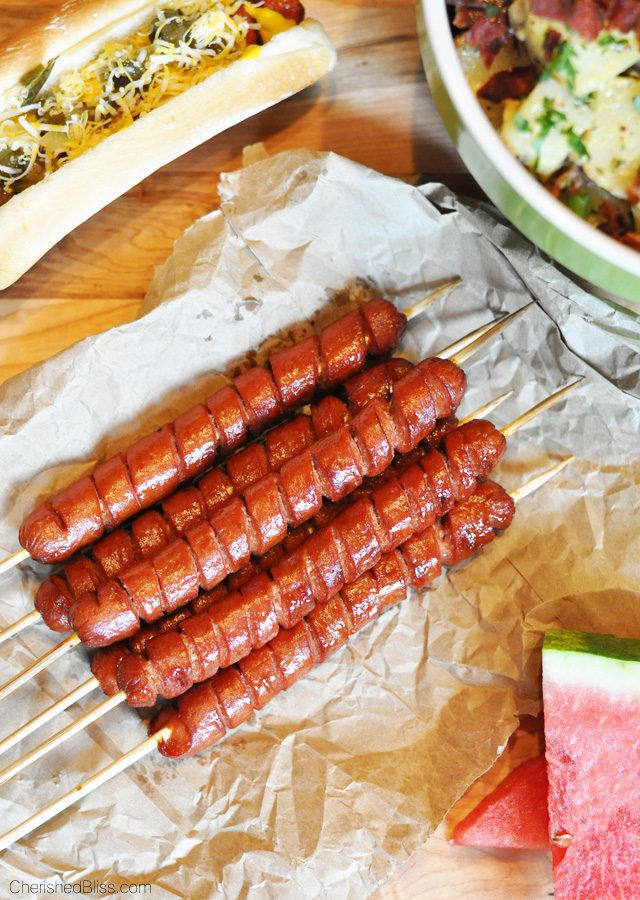 These grilled spiral cut hot dogs are a fun way to present the original hot dog and dress up your traditional cook out menu. 