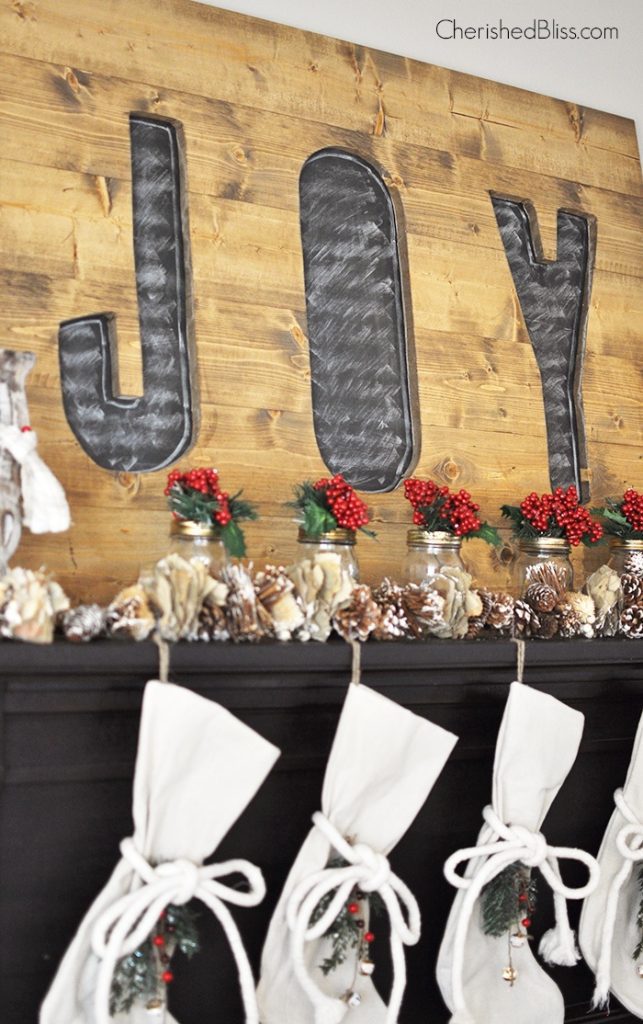 joy sign and stockings copyWelcome in Christmas with this beautiful Rustic Woodland Christmas Mantel