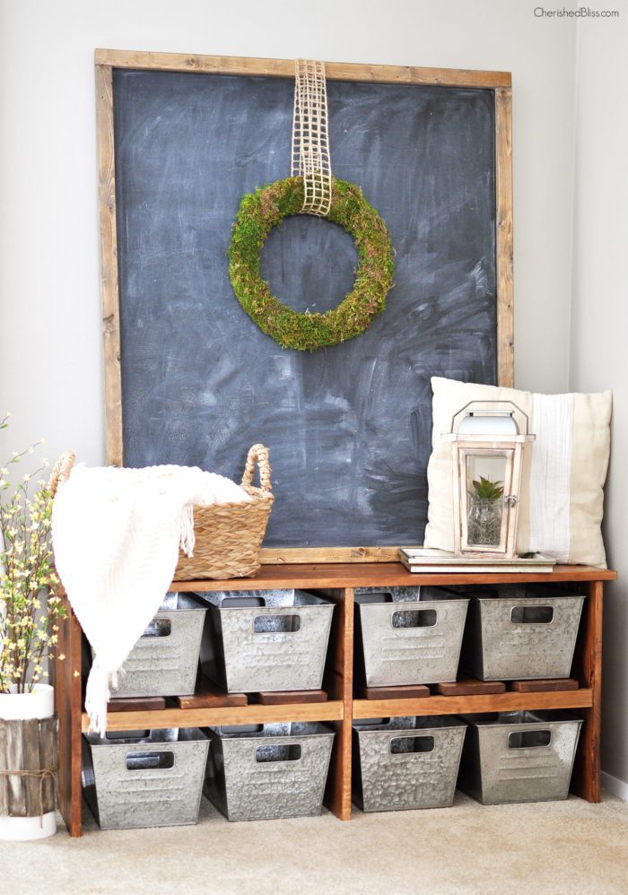 Love this Rustic Farmhouse Entryway! That bench, those bins! I want it all! 