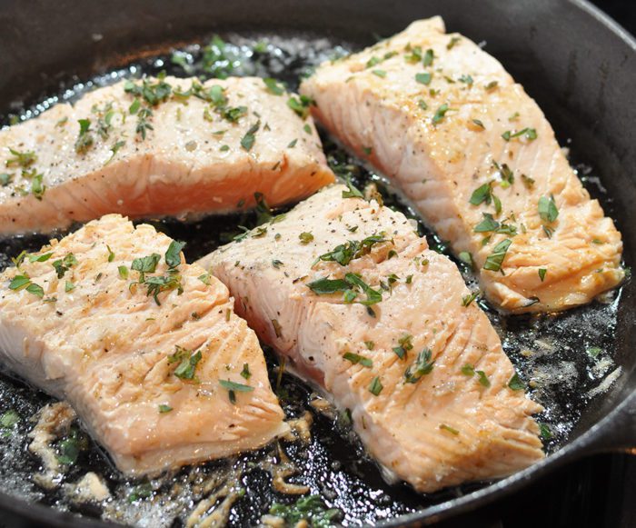Enjoy a healthy dinner with this Iron Skillet Seared Salmon served with a refreshing Creamy Leek Sauce. The perfect addition to your weekly menu! 