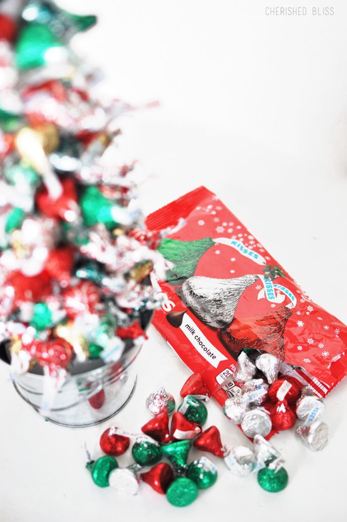 Create beautiful memories with your family by making a simple Hershey's Kisses Christmas Tree! 
