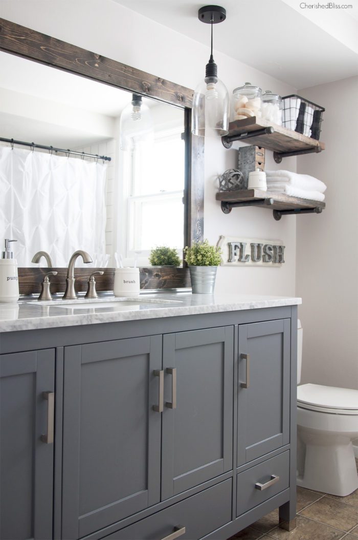 This Industrial Farmhouse Bathroom is the perfect blend of styles and creates such a cozy atmosphere! 