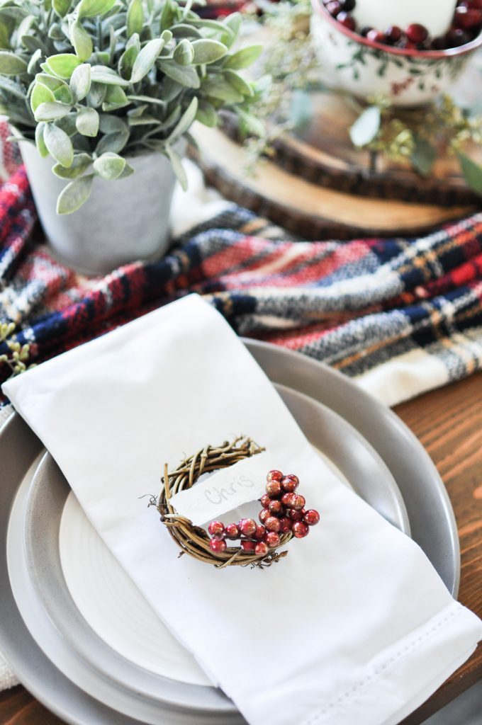 This quick and easy craft is the perfect addition to your holiday table. Make your guests feel welcome with their very own Mini Wreath Christmas Place Card! 