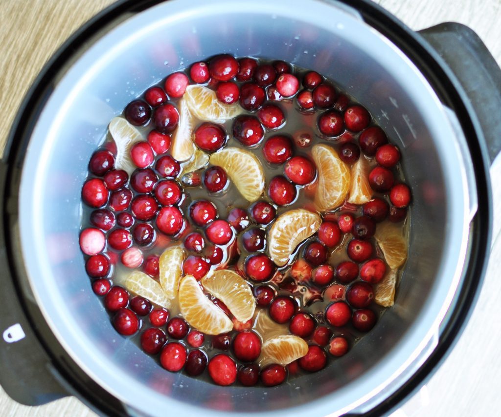 Fresh cranberries are transformed into a beautiful citrus-infused jam with this recipe for the perfect Holiday Electric Pressure Cooker Cranberry Sauce. 