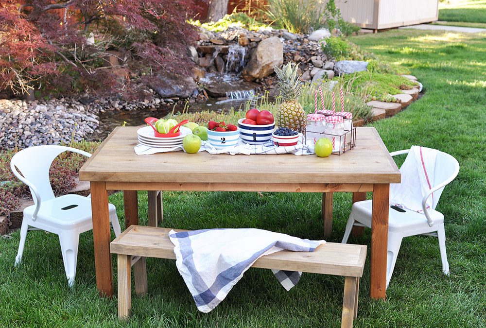 Give your kids an outdoor oasis with this easy to follow tutorial! Learn how to build this DIY Kids Outdoor Table and customize it to any style! 