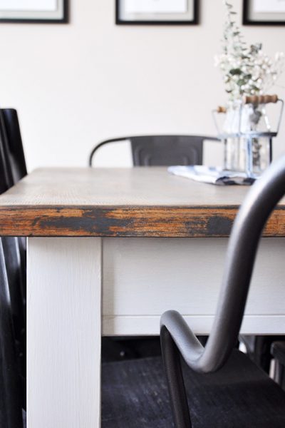 This table has seen an amazing transformation! Learn how to create the perfect Farmhouse Finish with this Farmhouse Dining Room Table Makeover.