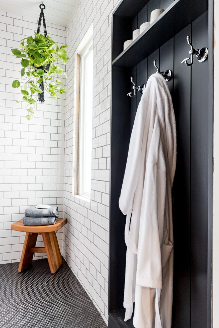 Beautiful place to hang towels in this industrial bathroom