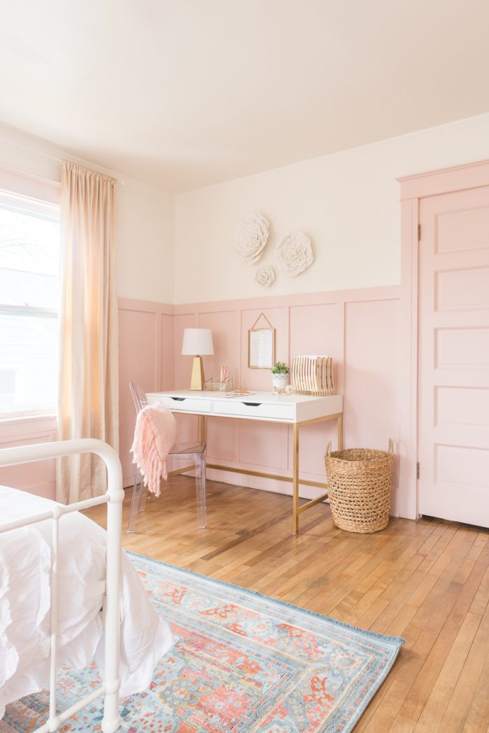 pink board and batten with white walls