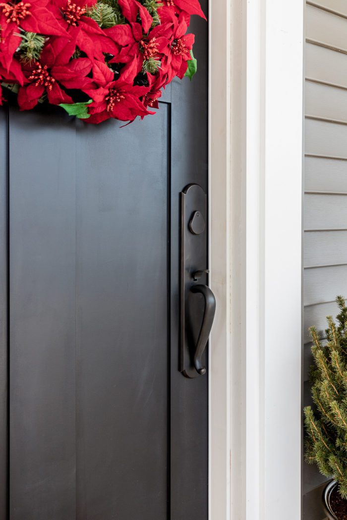 Completely transform the front of your house with these simple tips to refresh your winter front door decor and hardware.