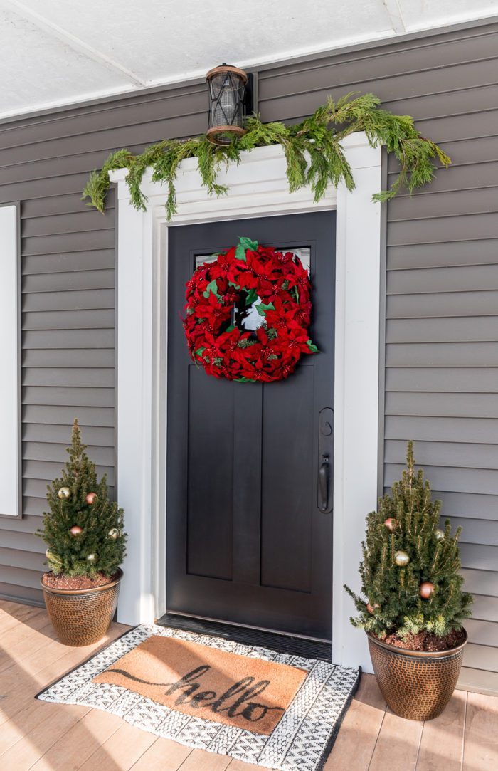 Completely transform the front of your house with these simple tips to refresh your winter front door decor and hardware.