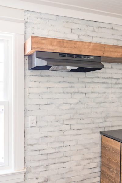 Install Vent Hood in Open Shelving: Add a simple vent hood to a kitchenette without the need for a cabinet.