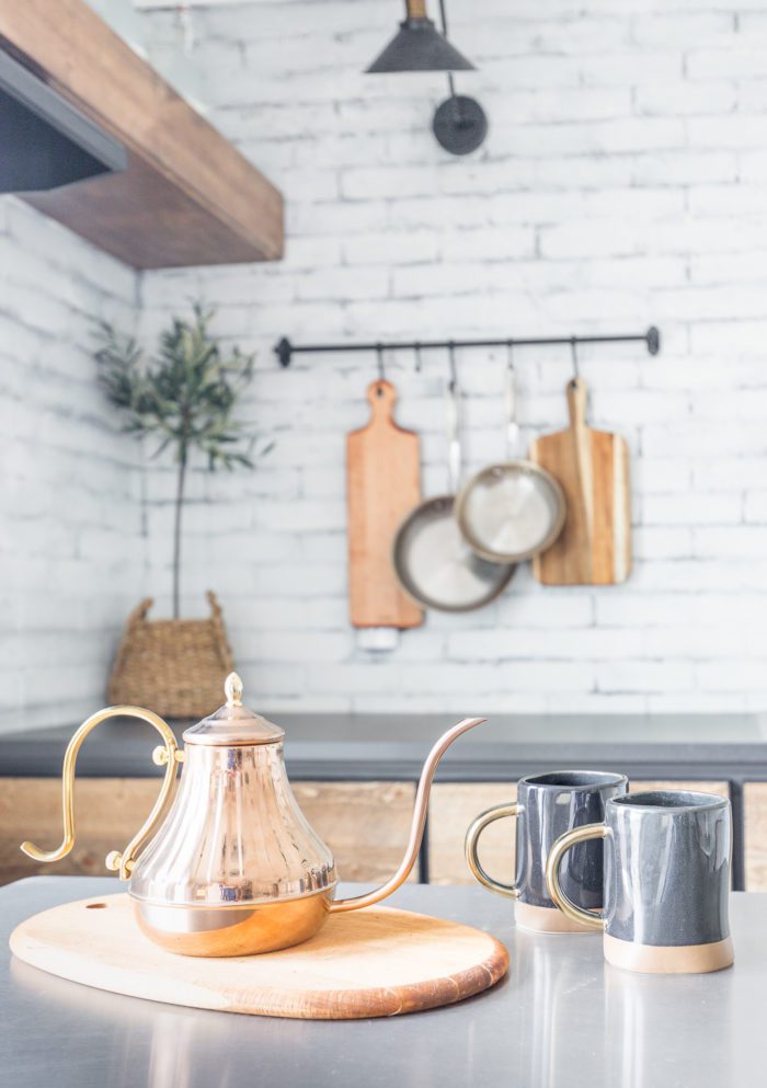 Take a tour of this Rustic Industrial Kitchenette inspired by coffee shops from all over! Full of DIY projects this little space is gentle on any budget!