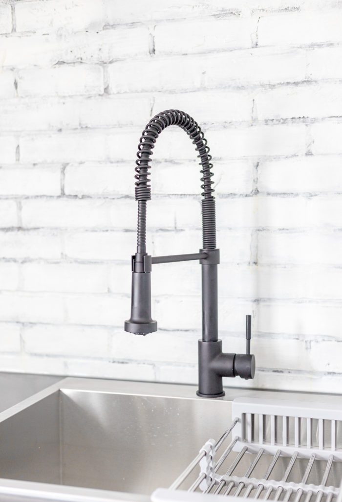 Stylish Black faucet in Kitchenette. 