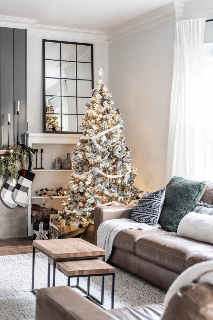Modern Rustic Christmas Tree in front of built ins. 