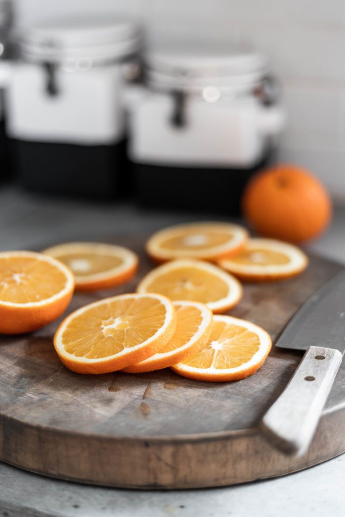 Sliced Oranges to prepare for dried fruit potpourri