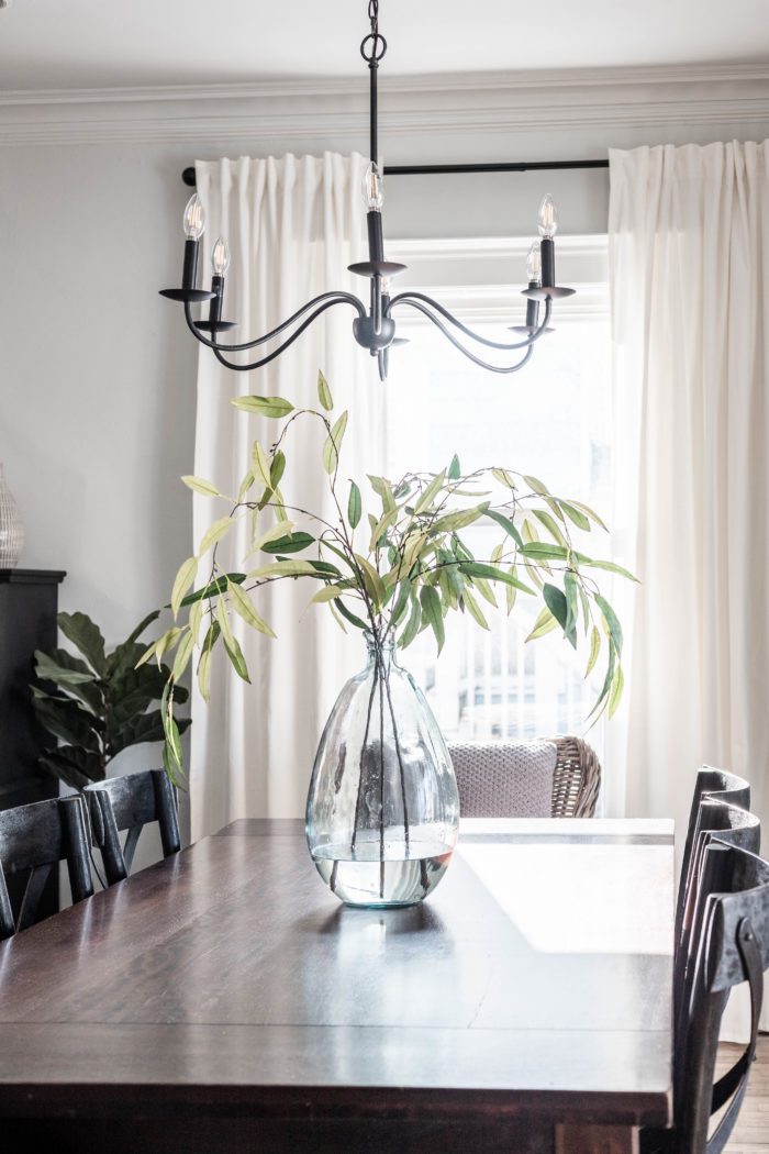 Black Modern Chandelier in Simple Formal Dining Room. 