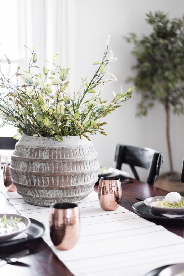 Use a planter as a centerpiece for a modern classic Easter tablescape. 