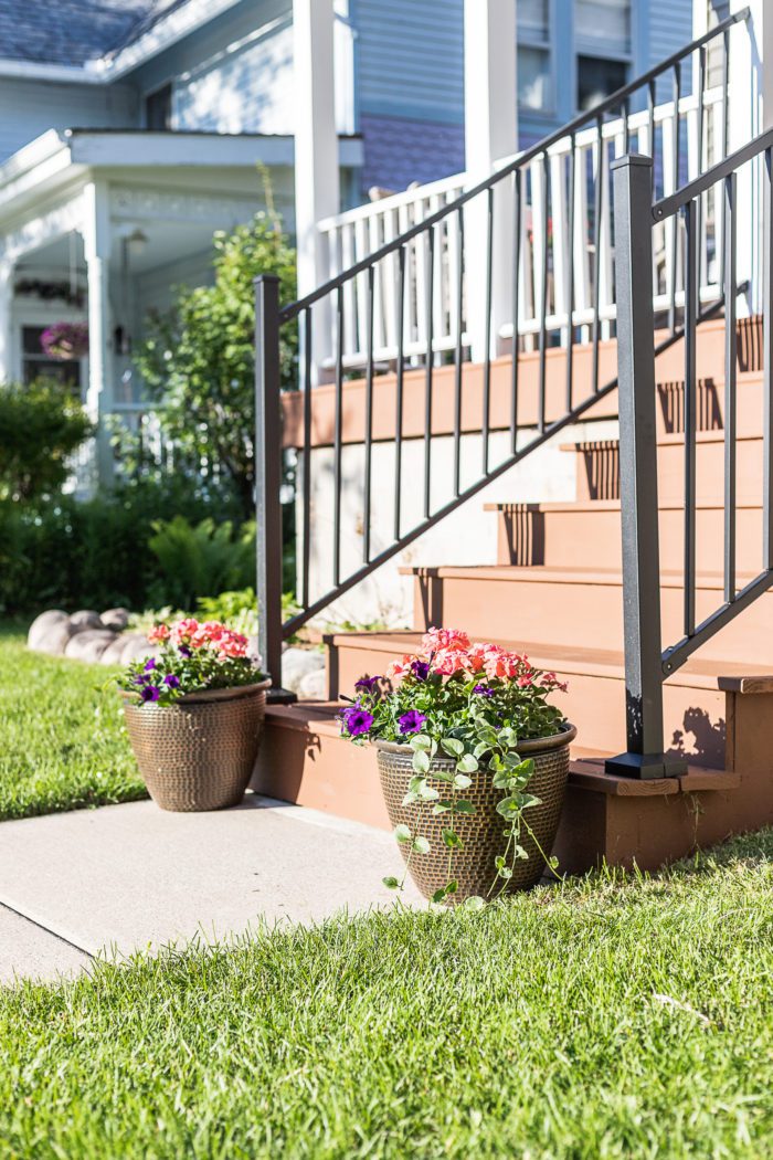 Front porch steps with planters for curb appeal. 