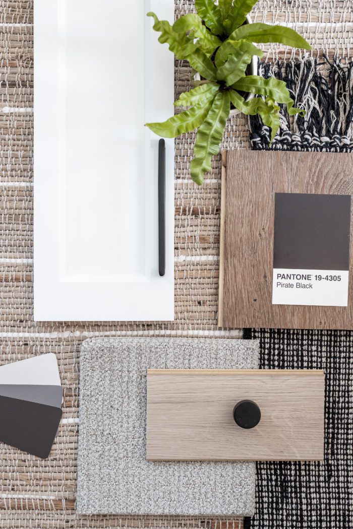 Modern Rustic Minimalist Design Board with white cabinets, wood tones, and black accents with a little greenery! 