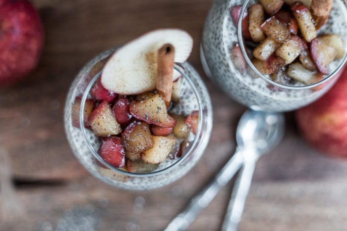 Apple Pie Chia Pudding garnished with fresh apple slice and cinnamon stick. 