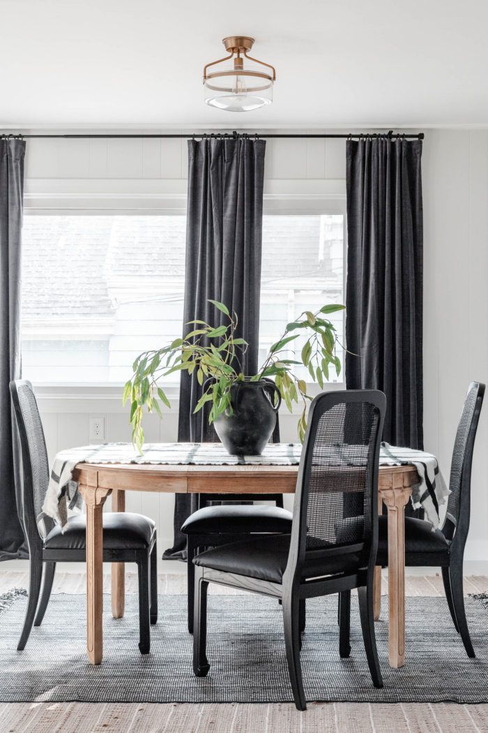 Breakfast Room Table Makeover with black velvet curtains and white walls. 