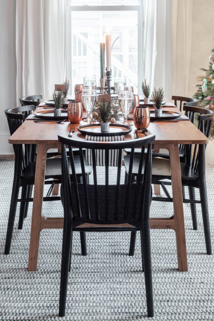 Black chairs, oak table, & a Christmas Tablescape