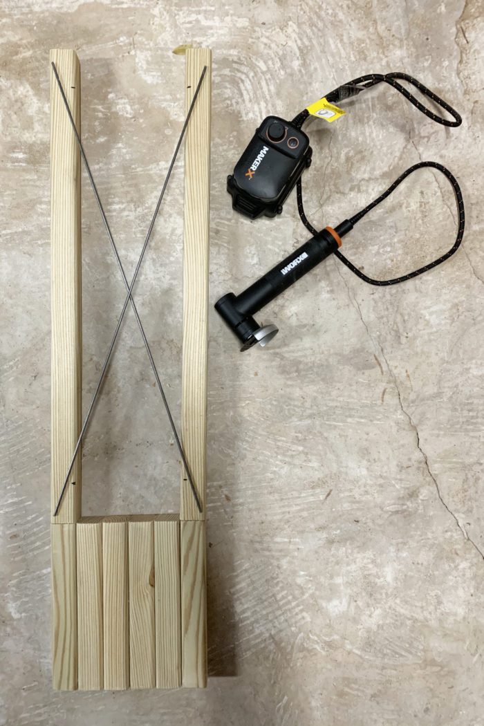 Use an Angle Grinder from the MakerX tool kit to create an x in your wood lanterns! 
