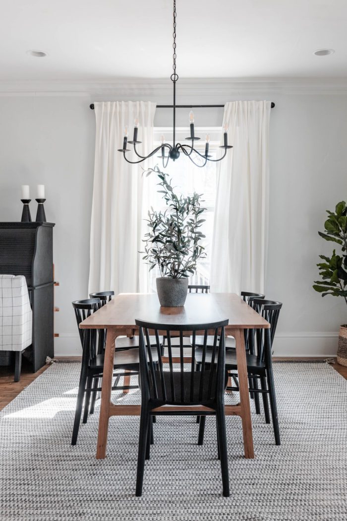 modern dining room decor and faux greenery complete this dining room space for the Neutral Spring Home Tour