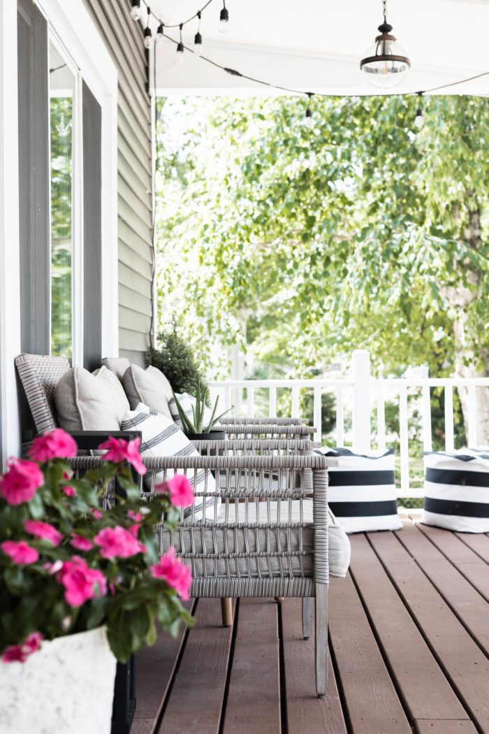 Simple Summer Porch Decor is used in this easy refresh to create a fun, inviting, and functional space to spend summer evenings as a family! 