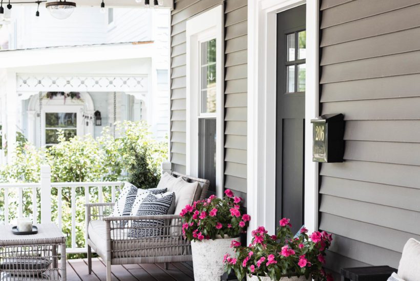 Simple Summer Porch Decor is used in this easy refresh to create a fun, inviting, and functional space to spend summer evenings as a family!