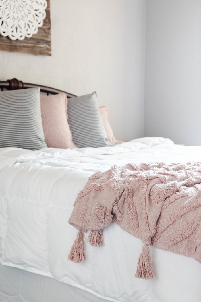 Cozy bedding for creating a welcoming guest room. 