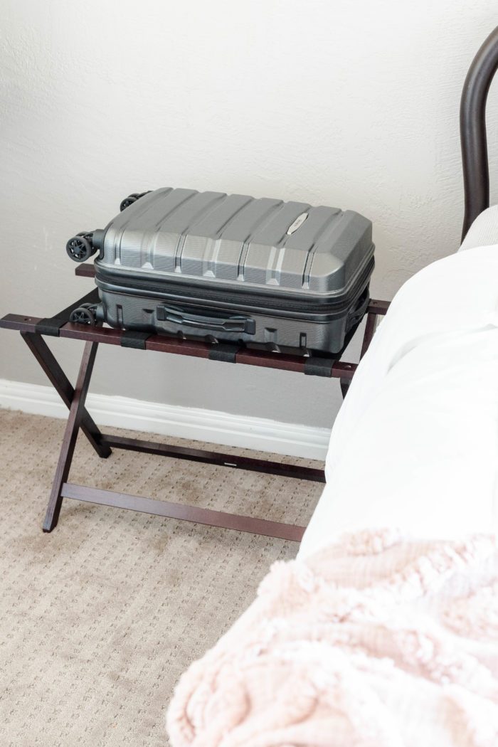 Use a luggage rack to provide a place for overnight guests to easily access their clothing. 