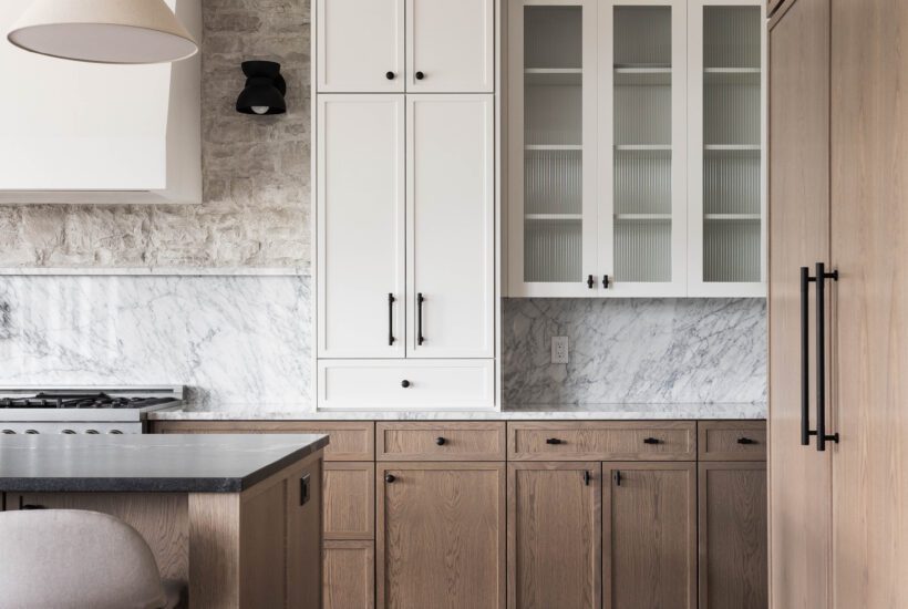 Tour this gorgeous new build and get tips on these kitchen design ideas inspired by a modern European look with furniture-inspired cabinets.