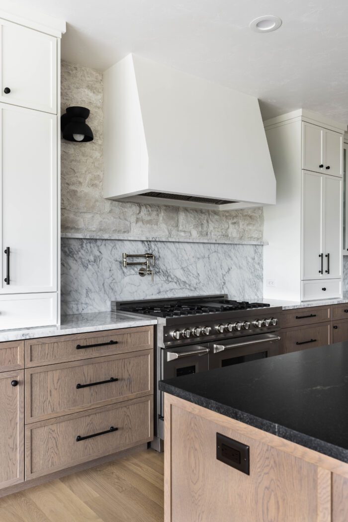 New Build Kitchen Design Ideas with marble ledge with stove above. 