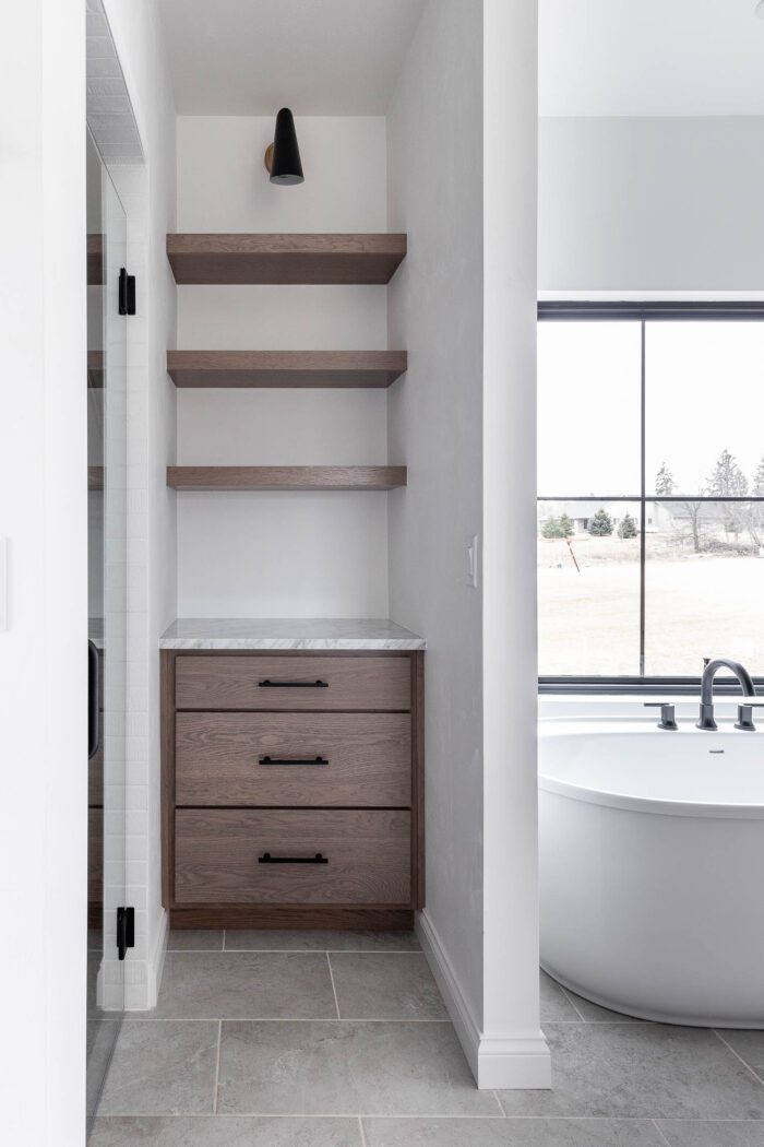 Open Shelving and Drawers for linen storage in master bathroom. 